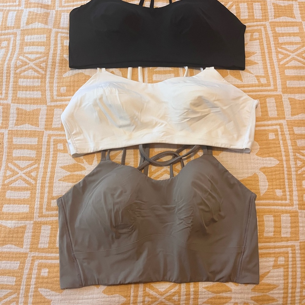 Set of 3 Lululemon Like a Cloud bras in Black, White, and Gray
